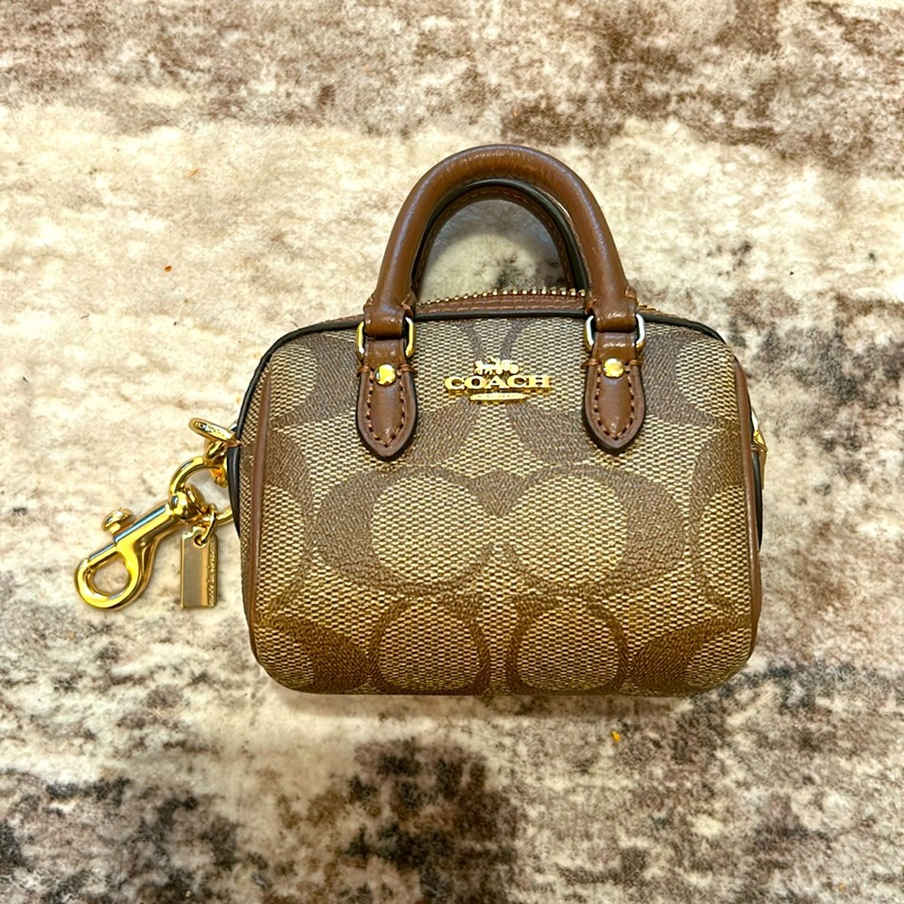 Mini Rowan Bag Charm In Signature Canvas - image 1